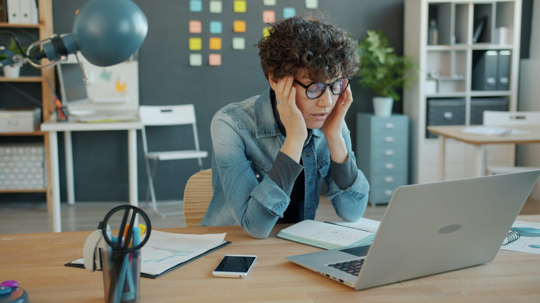 stressed businessman at computer